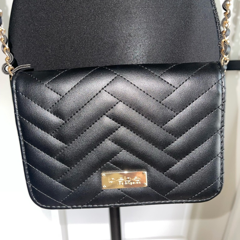 Bebe Black Crossbody Bag with Structured Silhouette and Polished Finish